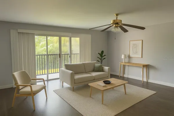 a living room with furniture and a window