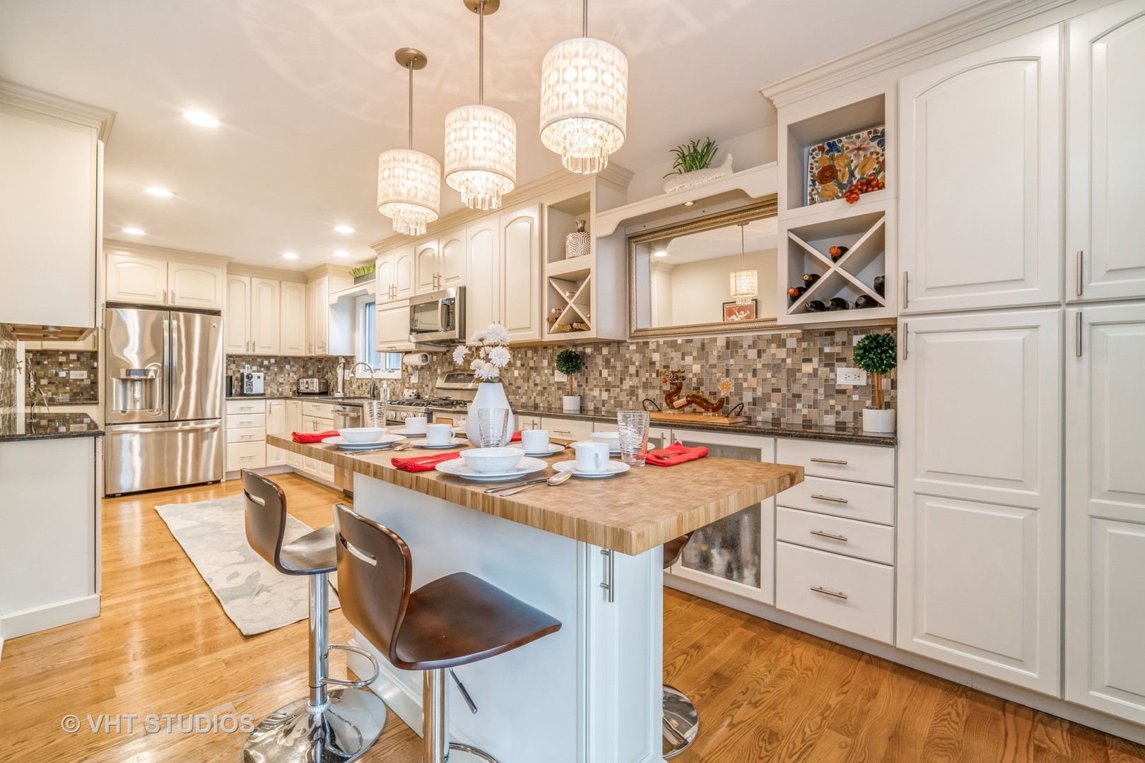 1557 Winnetka Road Glenview, IL 60025 - Photo 7 of 21 a kitchen with stainless steel appliances granite countertop a sink and cabinets
