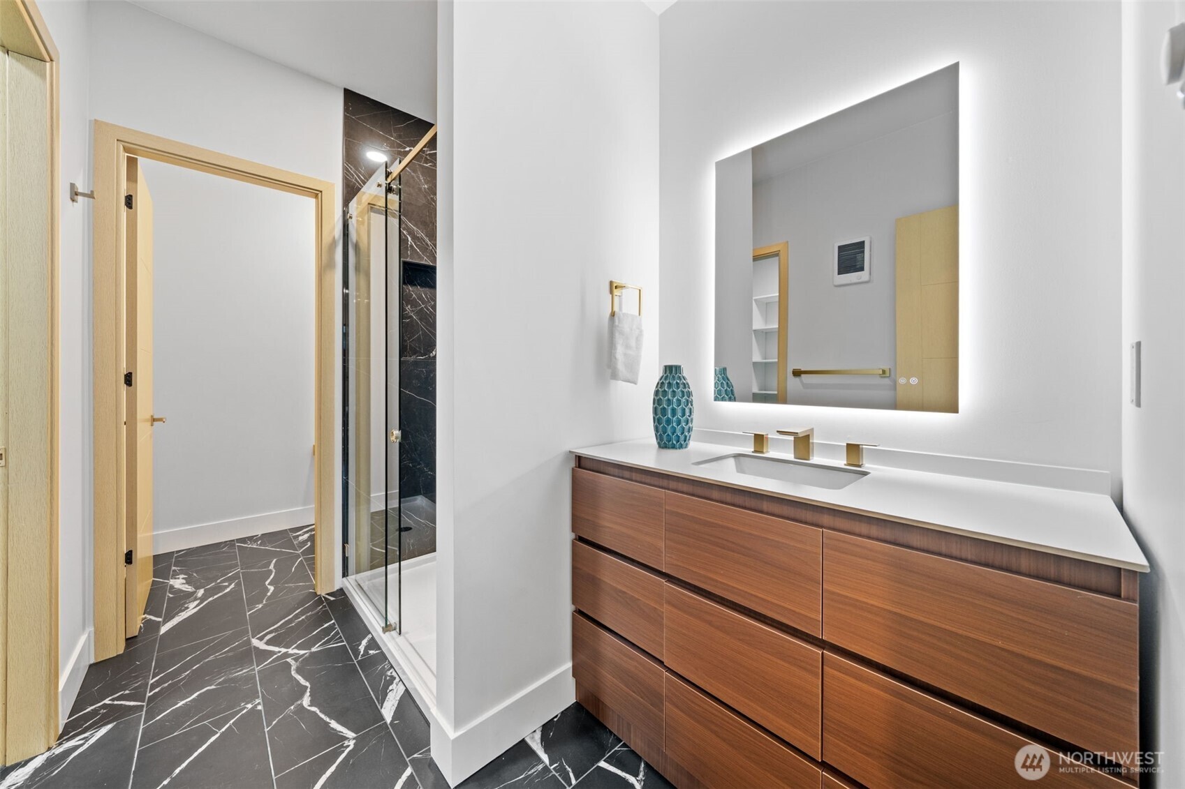 7903 240th Street Southwest Edmonds, WA 98026 - Photo 29 of 35 a bathroom with a sink and a mirror
