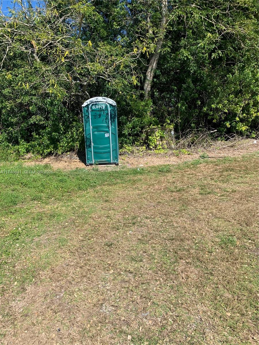 0 Tbd Homestead, FL 33030 - Photo 5 of 10 a backyard of a house with a trees and plants