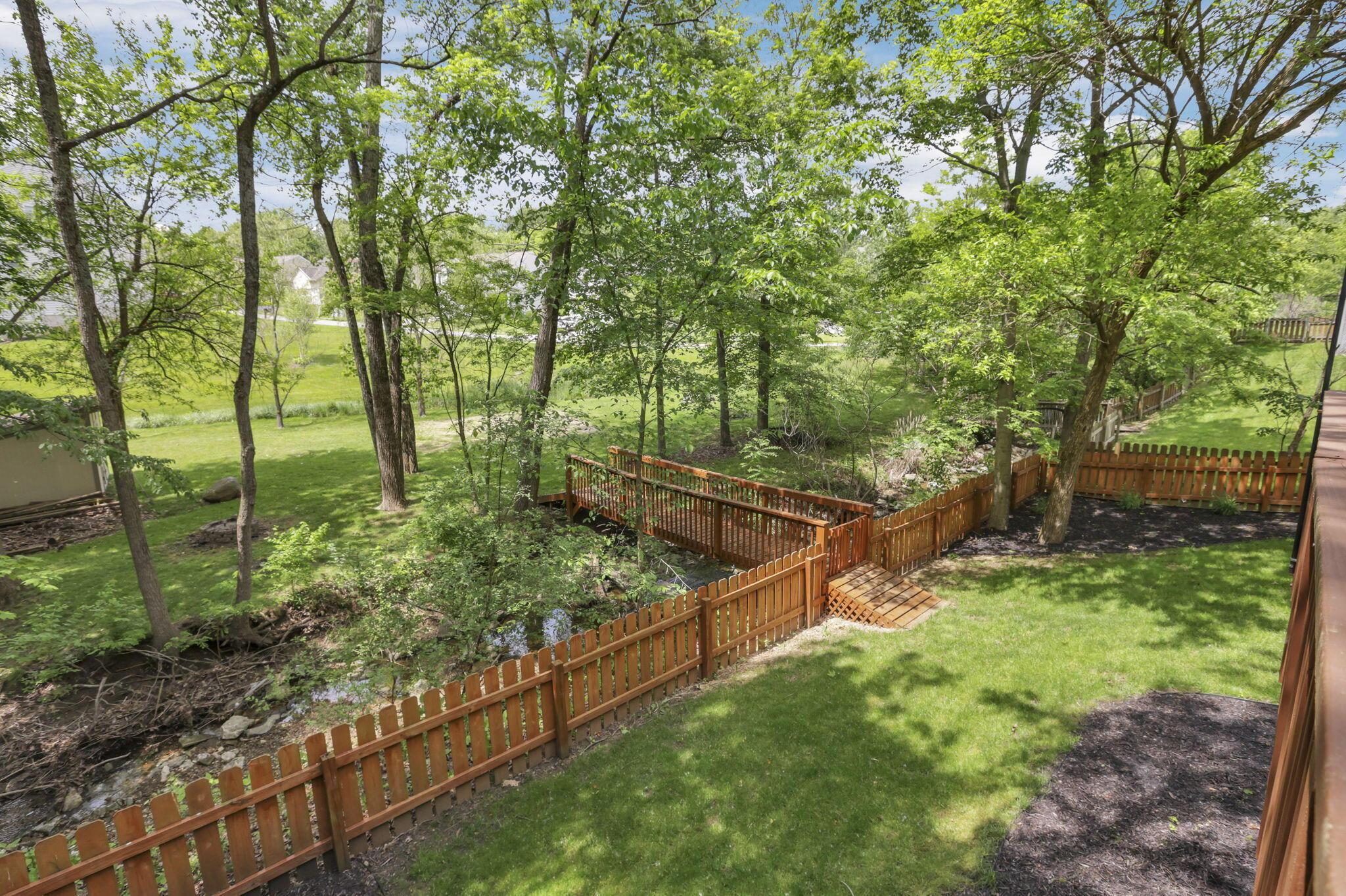 445 Barrington Ridge Pataskala, OH 43062 - Photo 49 of 65 Fenced-in backyard w/stream