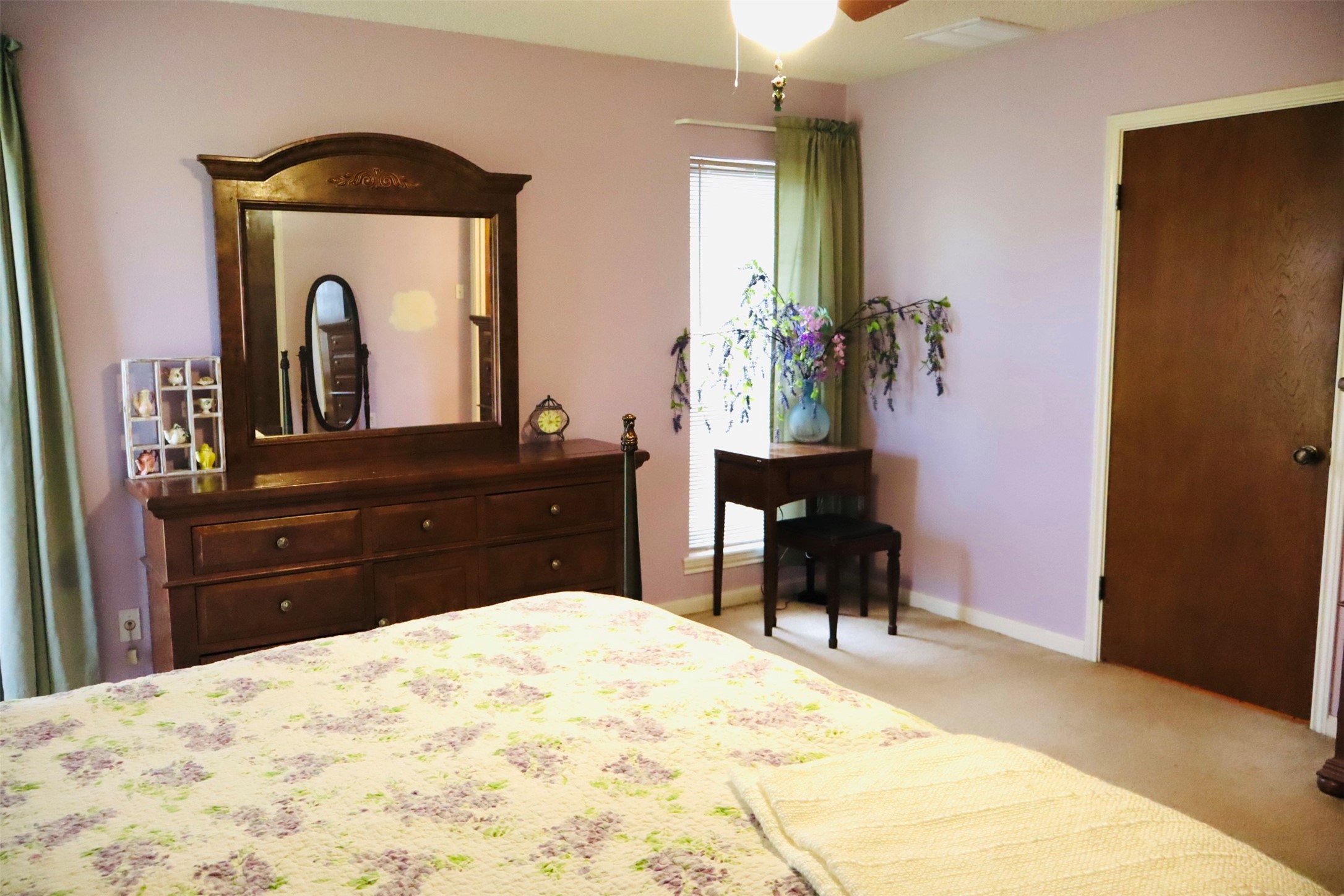 1108 Easy Street Rosenberg, TX 77471 - Photo 14 of 28 a bedroom with a bed and a dresser