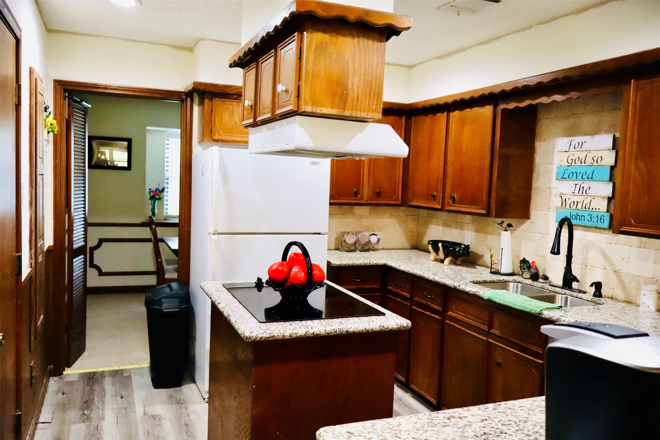 1108 Easy Street Rosenberg, TX 77471 - Photo 9 of 28 a kitchen with a sink a stove and cabinets