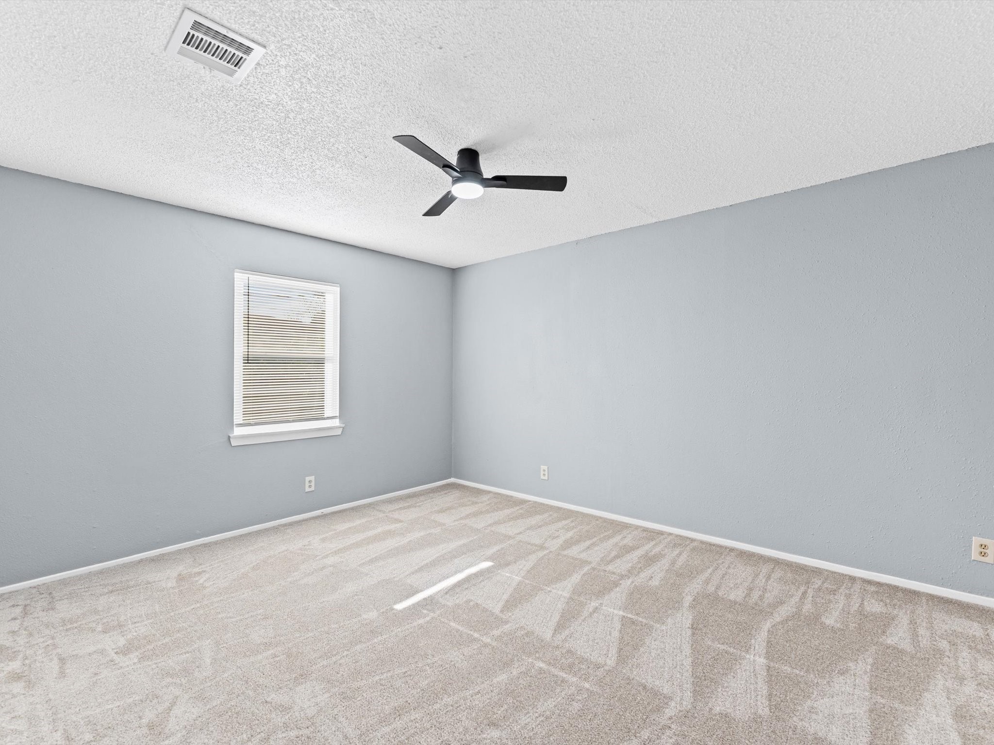 10918 Ritow Street Houston, TX 77089 - Photo 11 of 26 a view of an empty room with a window