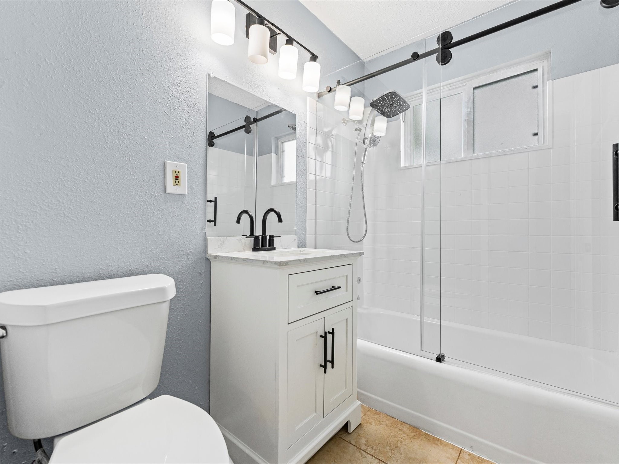 10918 Ritow Street Houston, TX 77089 - Photo 15 of 26 a bathroom with a sink toilet and shower