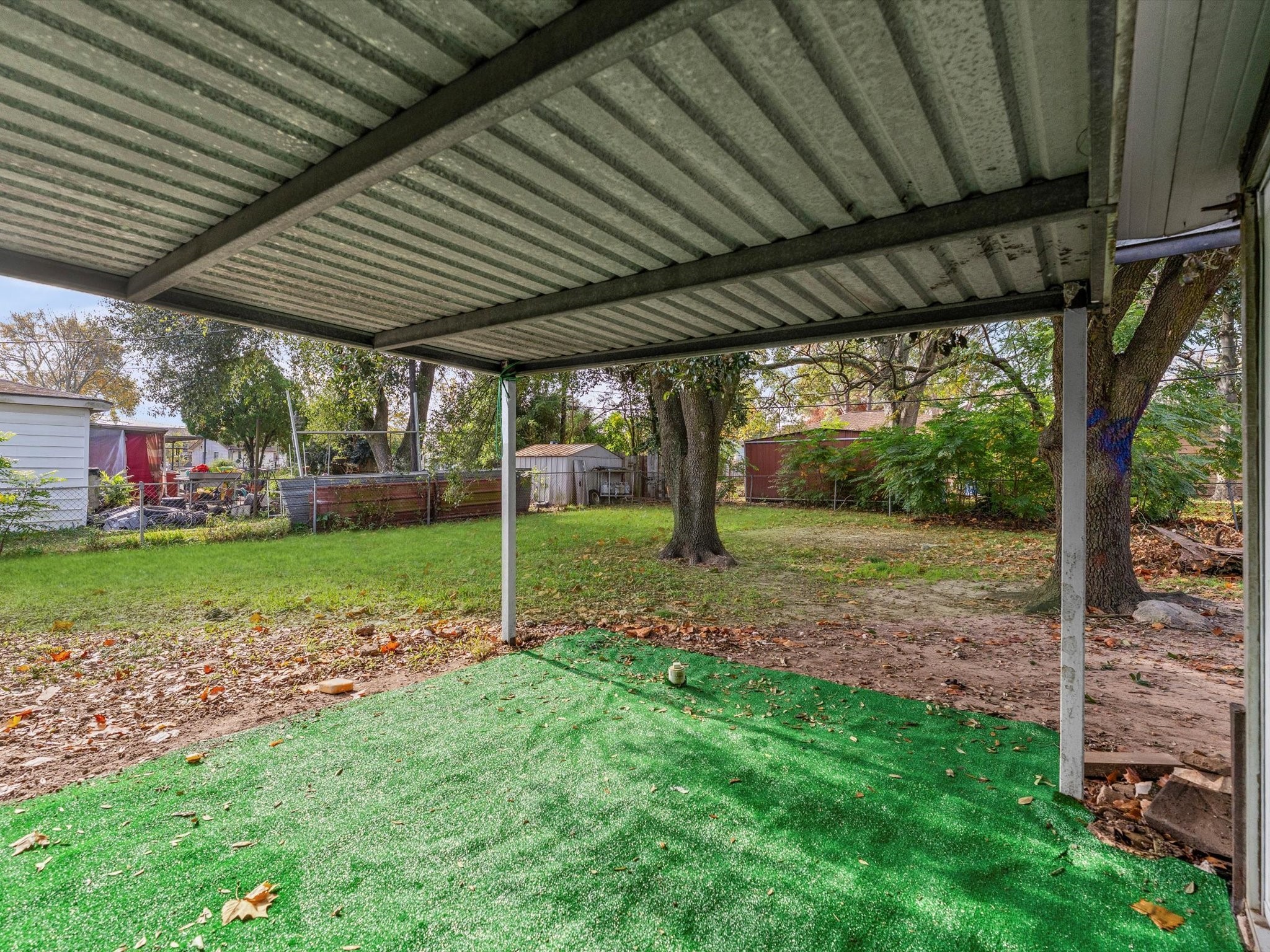 10918 Ritow Street Houston, TX 77089 - Photo 21 of 26 a view of a porch with a backyard