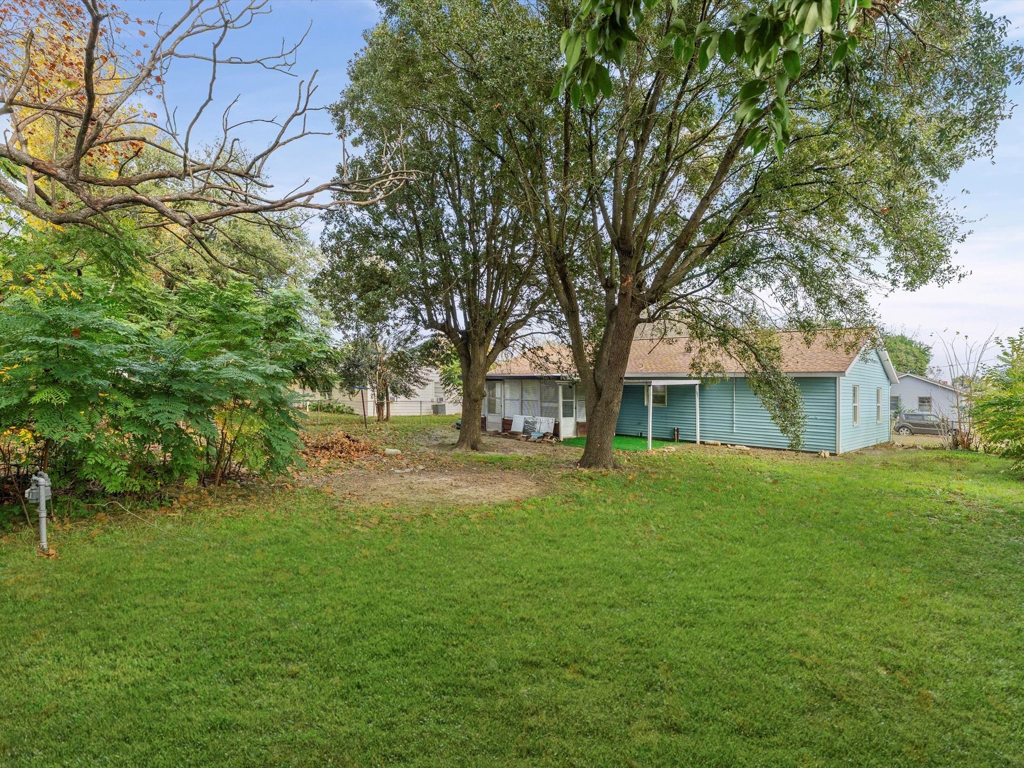 10918 Ritow Street Houston, TX 77089 - Photo 23 of 26 a front view of a house with a garden