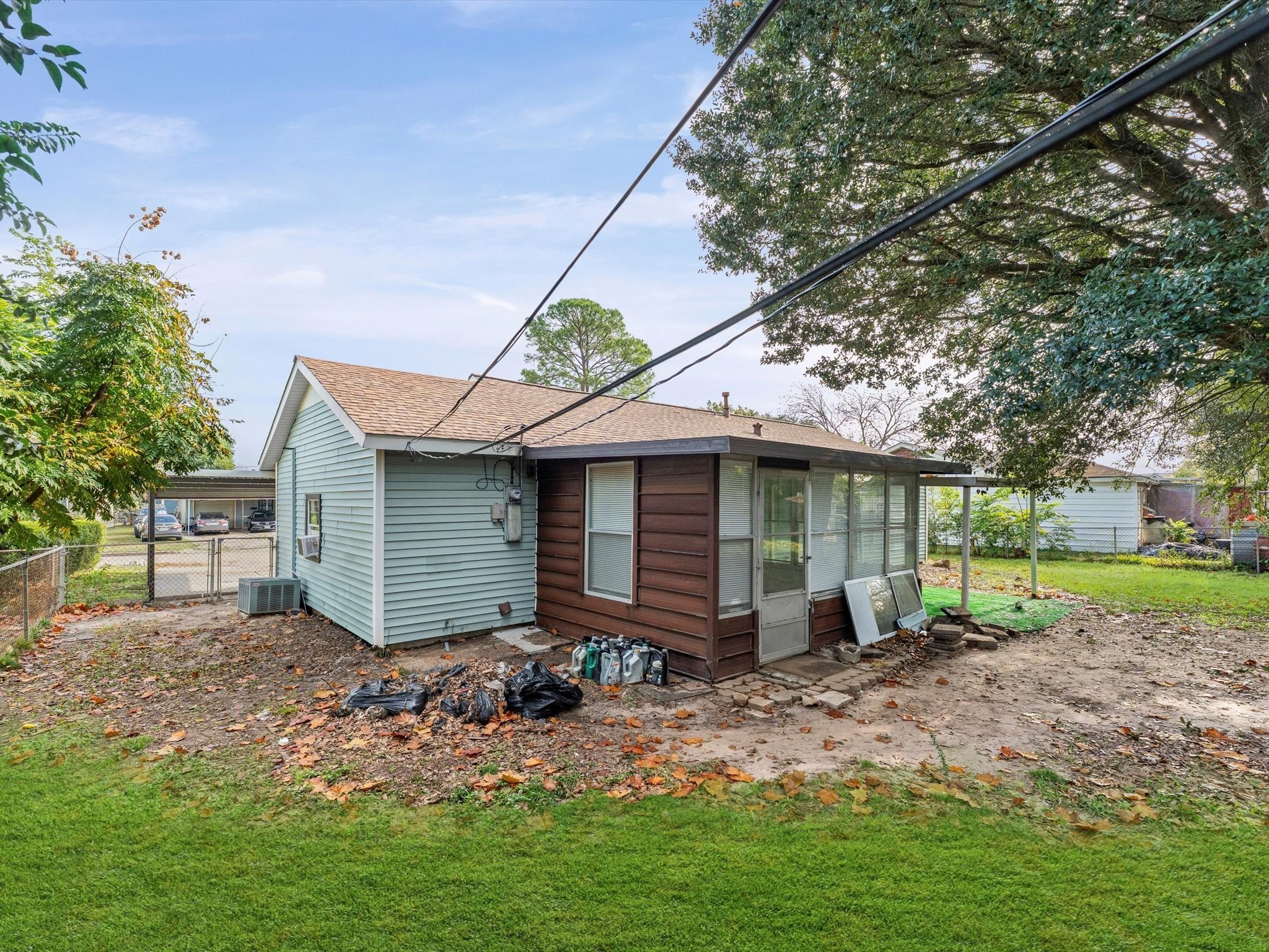 10918 Ritow Street Houston, TX 77089 - Photo 25 of 26 a view of a house with a yard