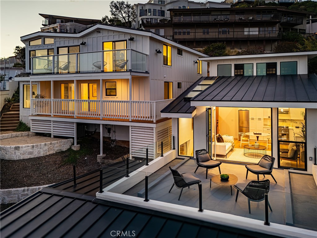 View from ocean side of property at dusk