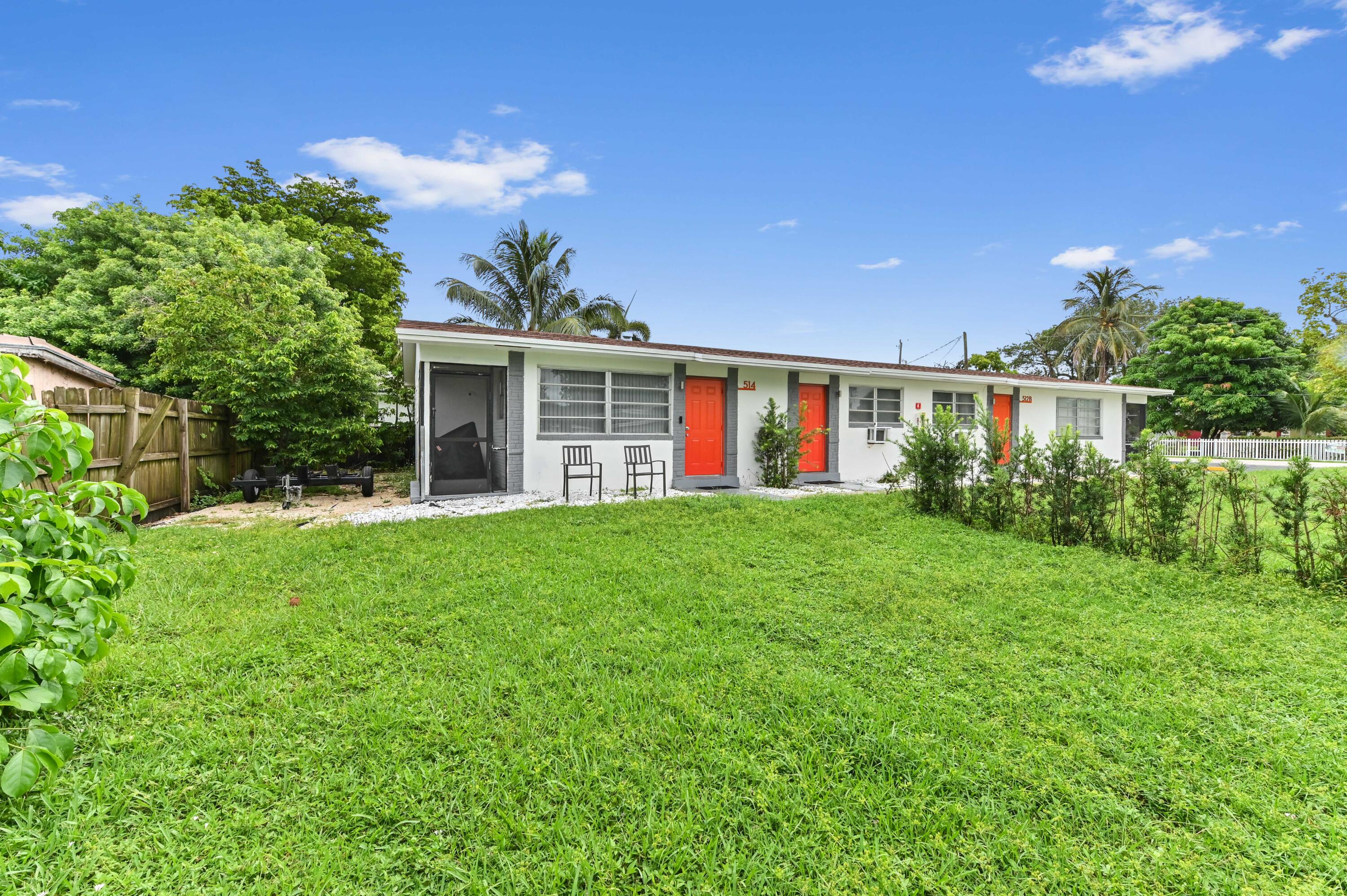 538 Southwest 7th Street Hallandale Beach, FL 33009 - Photo 11 of 35 a view of a house with backyard and garden