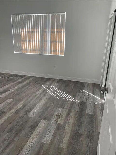538 Southwest 7th Street Hallandale Beach, FL 33009 - Photo 20 of 35 a view of an empty room with a window