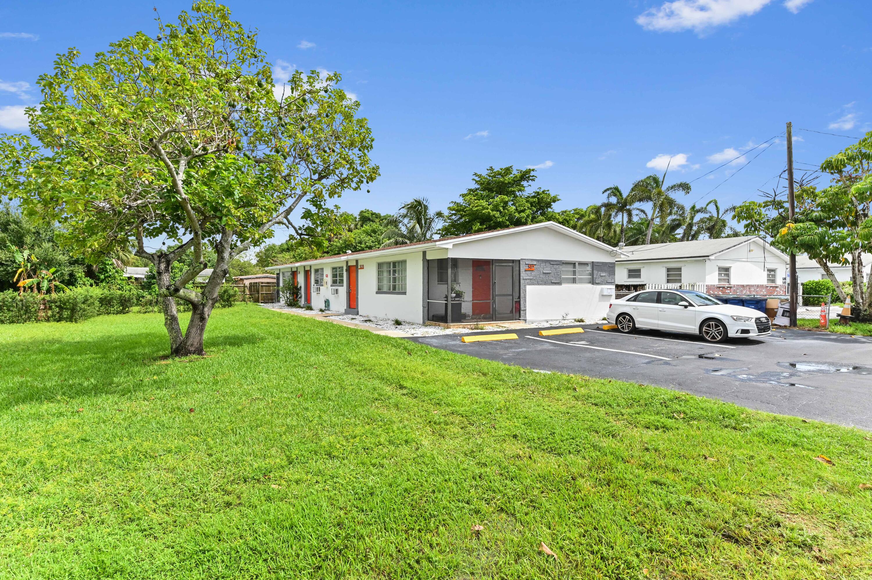 538 Southwest 7th Street Hallandale Beach, FL 33009 - Photo 6 of 35 a house view with a garden space