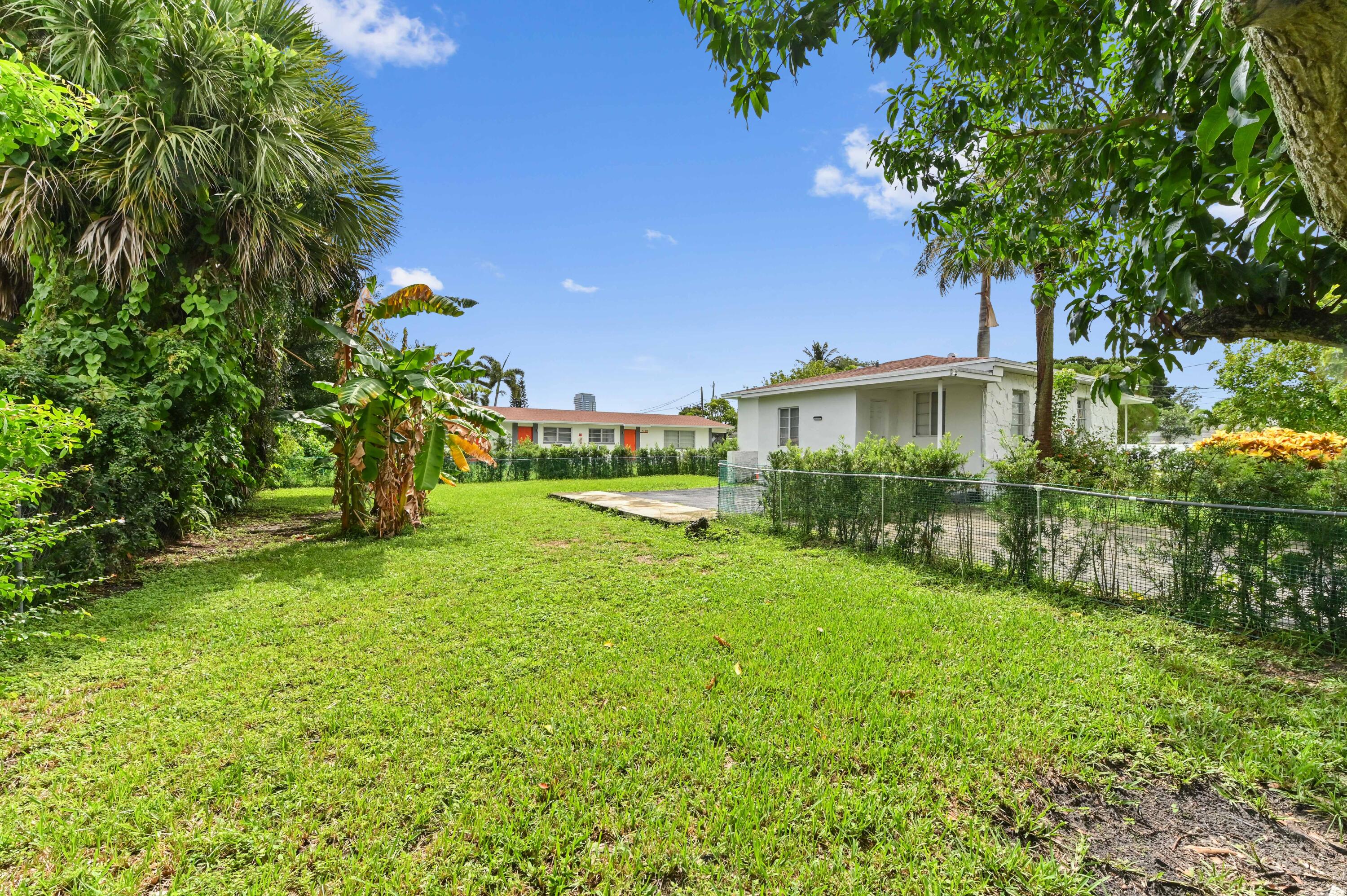 538 Southwest 7th Street Hallandale Beach, FL 33009 - Photo 9 of 35 a view of a house with a yard