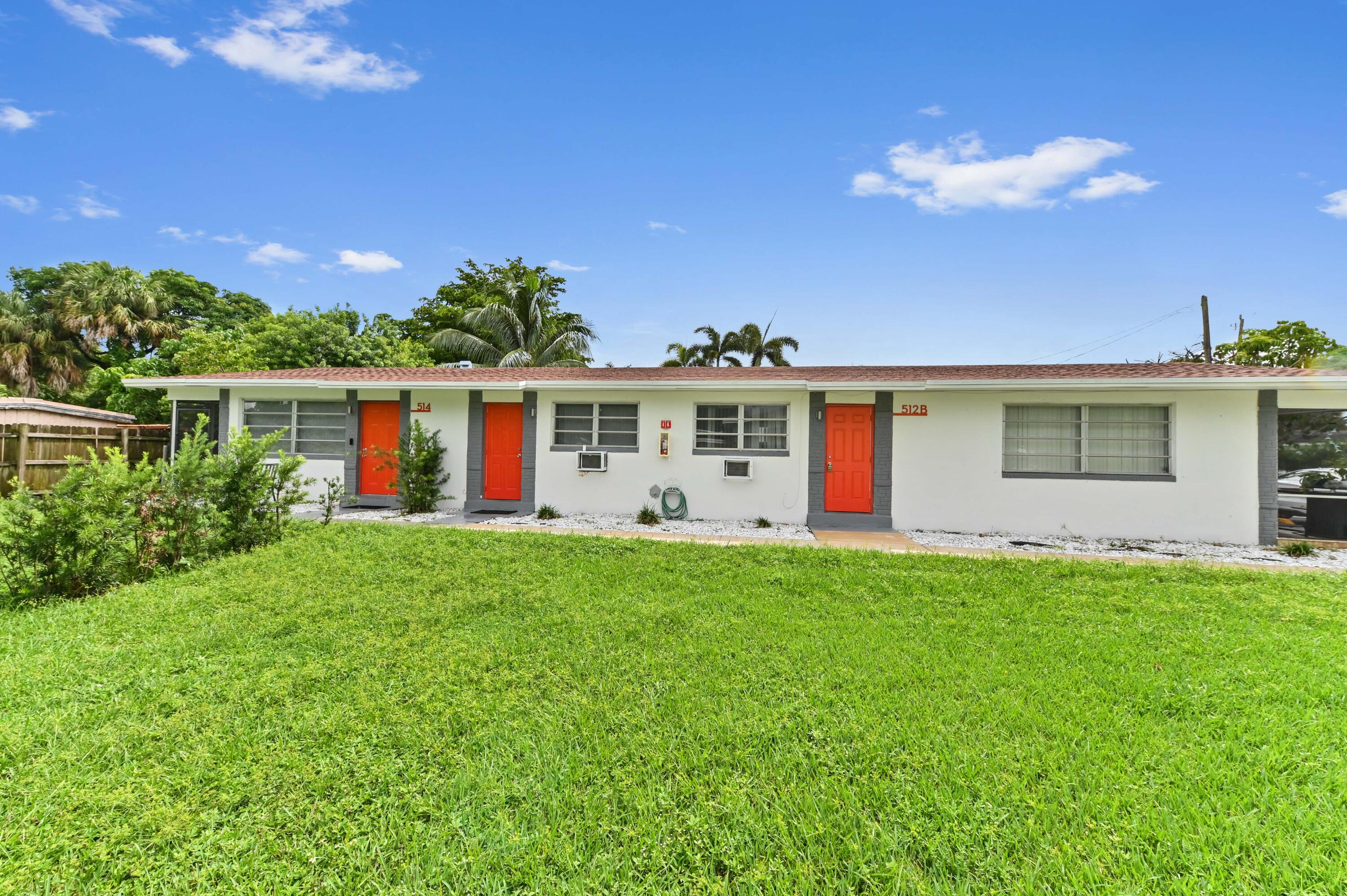 538 Southwest 7th Street Hallandale Beach, FL 33009 - Photo 10 of 35 a view of a house with backyard porch and garden