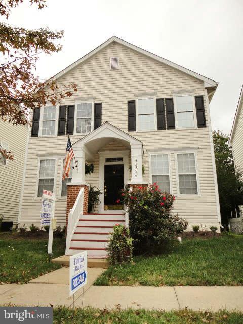 43396 Edgewater Street Chantilly, VA 20152 - Photo 1 of 16 a front view of a house with a yard