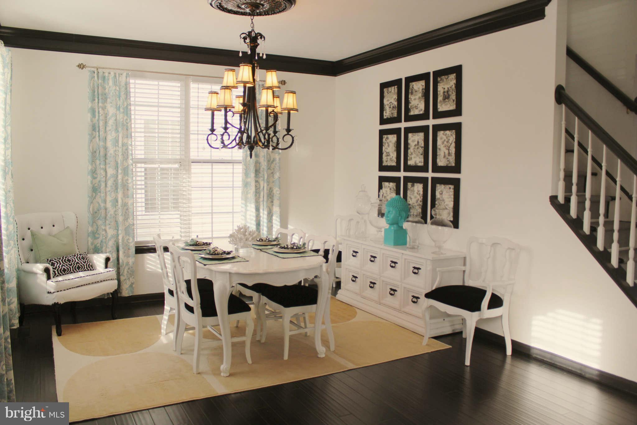 43396 Edgewater Street Chantilly, VA 20152 - Photo 2 of 16 a view of a dining room with furniture window and wooden floor