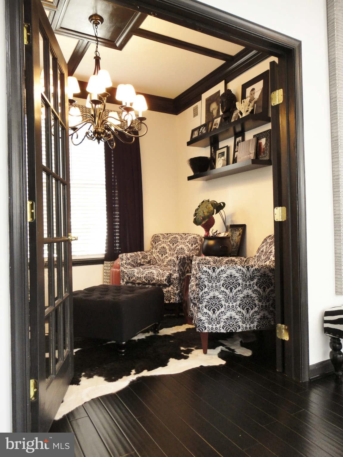 43396 Edgewater Street Chantilly, VA 20152 - Photo 3 of 16 a bedroom with a large bed and a chandelier