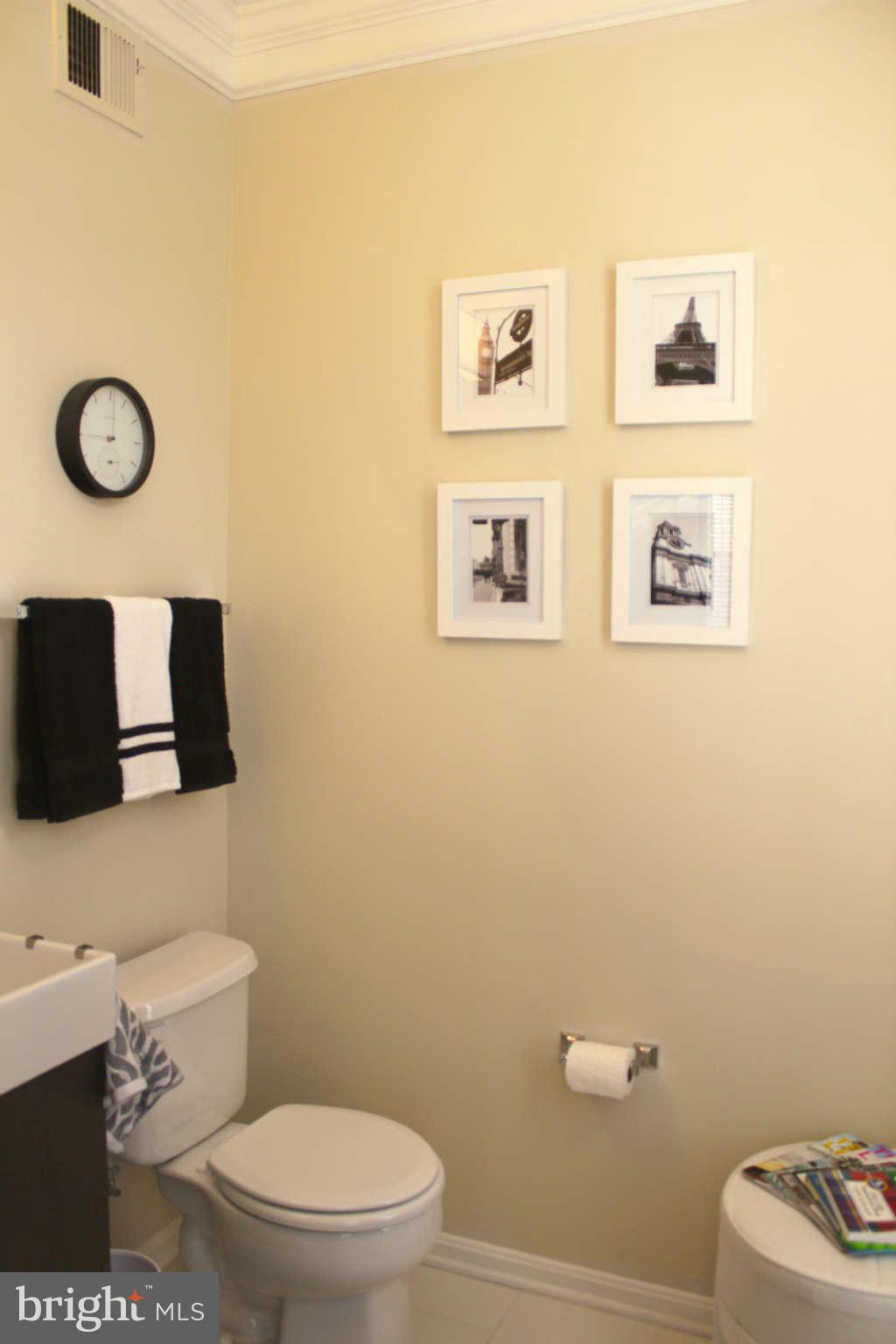 43396 Edgewater Street Chantilly, VA 20152 - Photo 7 of 16 a bathroom with a toilet and a shower