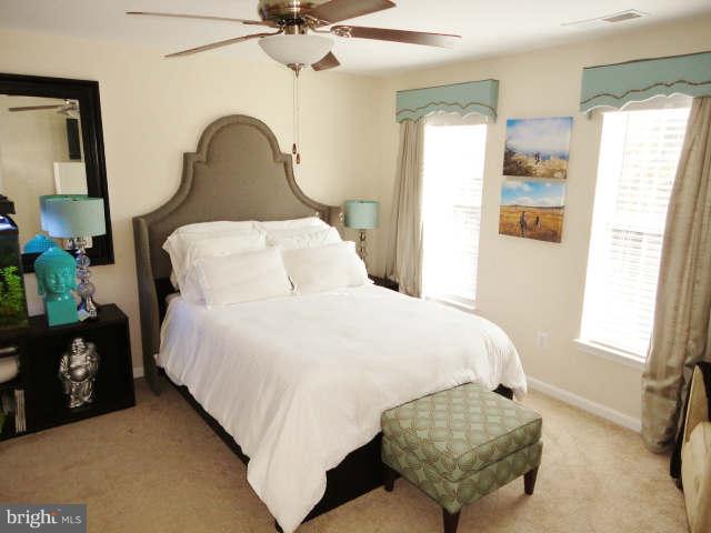 43396 Edgewater Street Chantilly, VA 20152 - Photo 8 of 16 a bedroom with bed and window