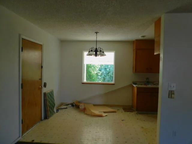 a bathroom with a sink and toilet
