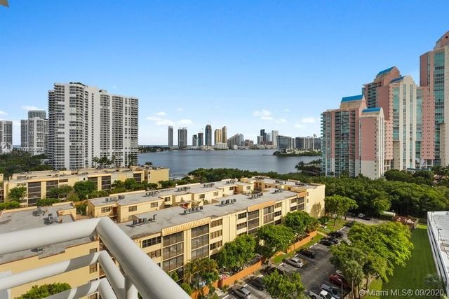 a view of city with tall buildings