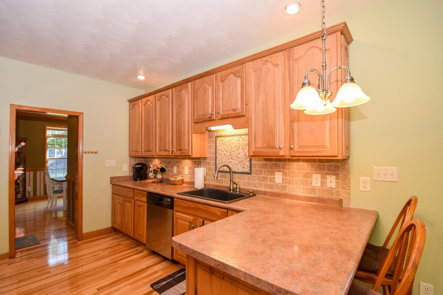 213 W Road Blue Ridge, VA 24064 - Photo 11 of 51 a kitchen with a sink and a refrigerator