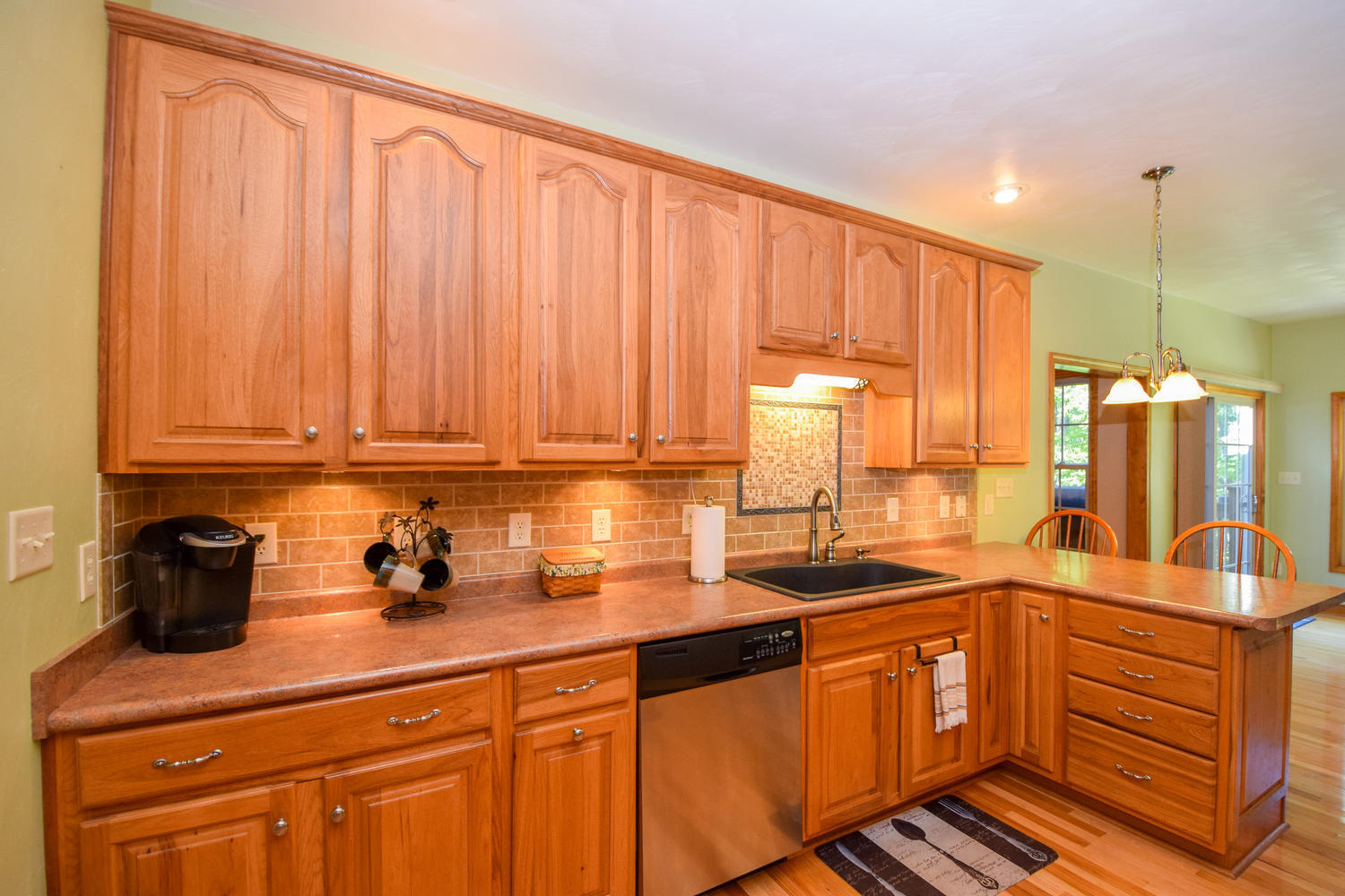213 W Road Blue Ridge, VA 24064 - Photo 12 of 51 a kitchen with stainless steel appliances granite countertop a sink a stove and cabinets