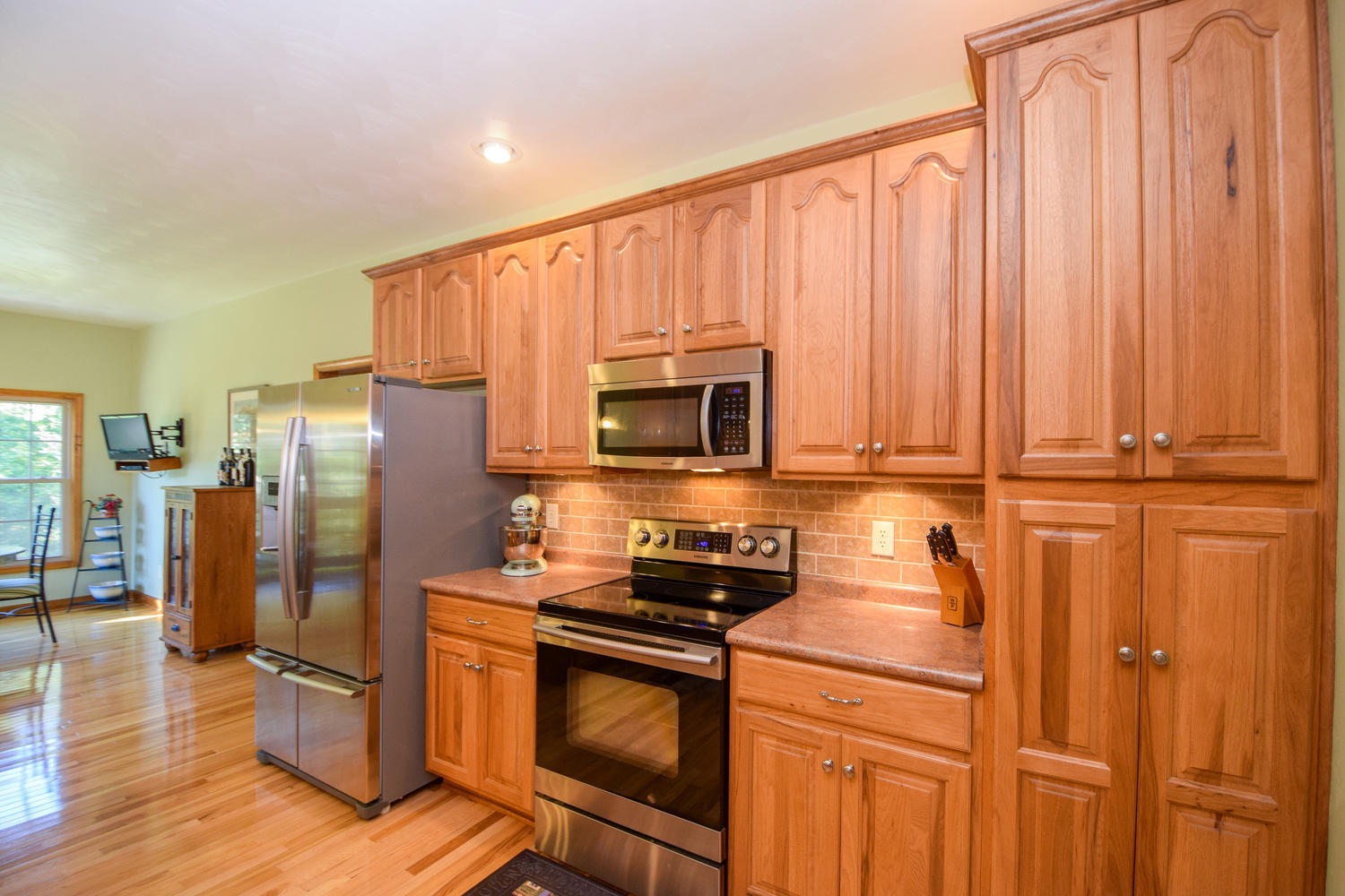 213 W Road Blue Ridge, VA 24064 - Photo 13 of 51 a kitchen with stainless steel appliances granite countertop a refrigerator stove and sink