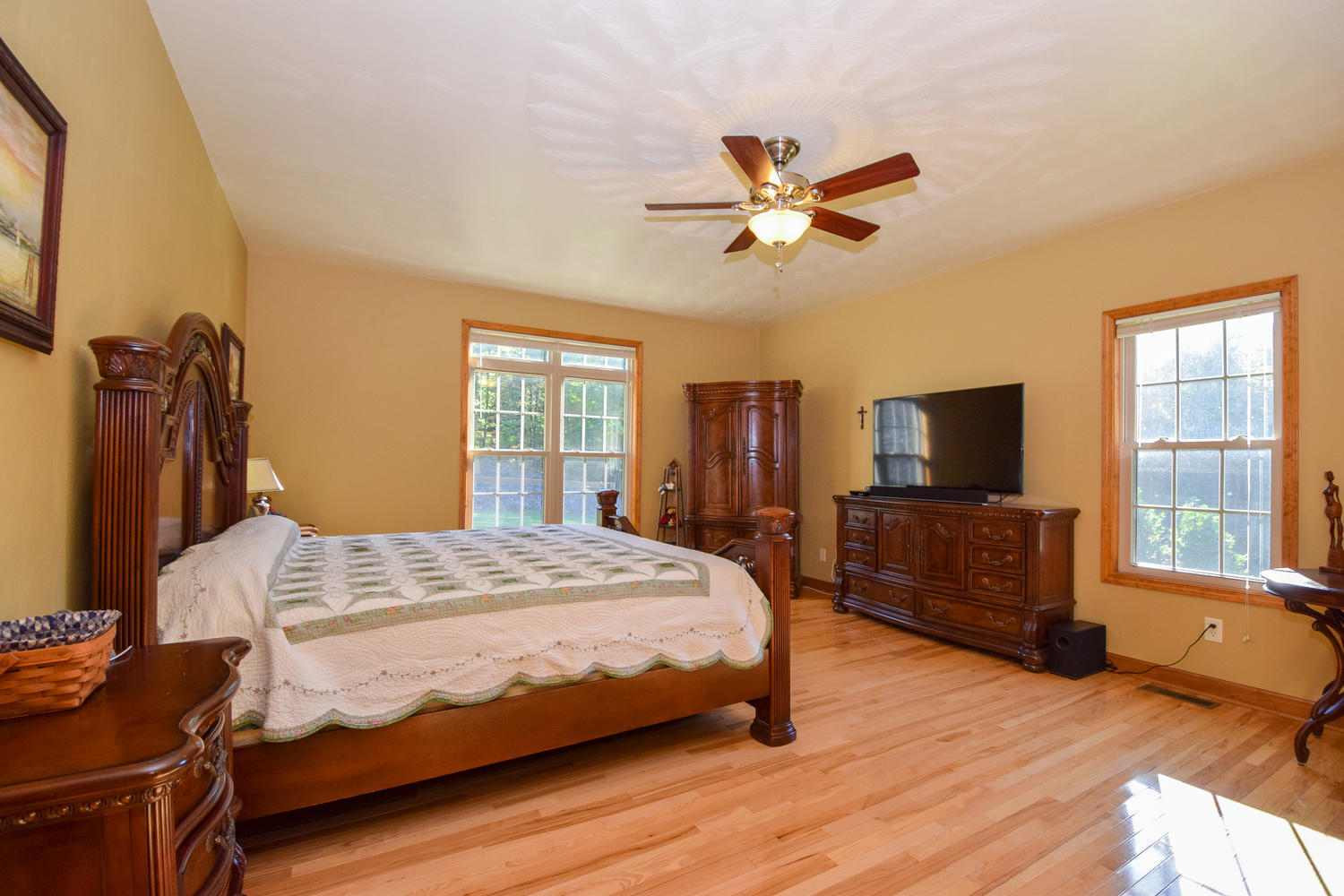 213 W Road Blue Ridge, VA 24064 - Photo 15 of 51 a bedroom with a bed and wooden floor