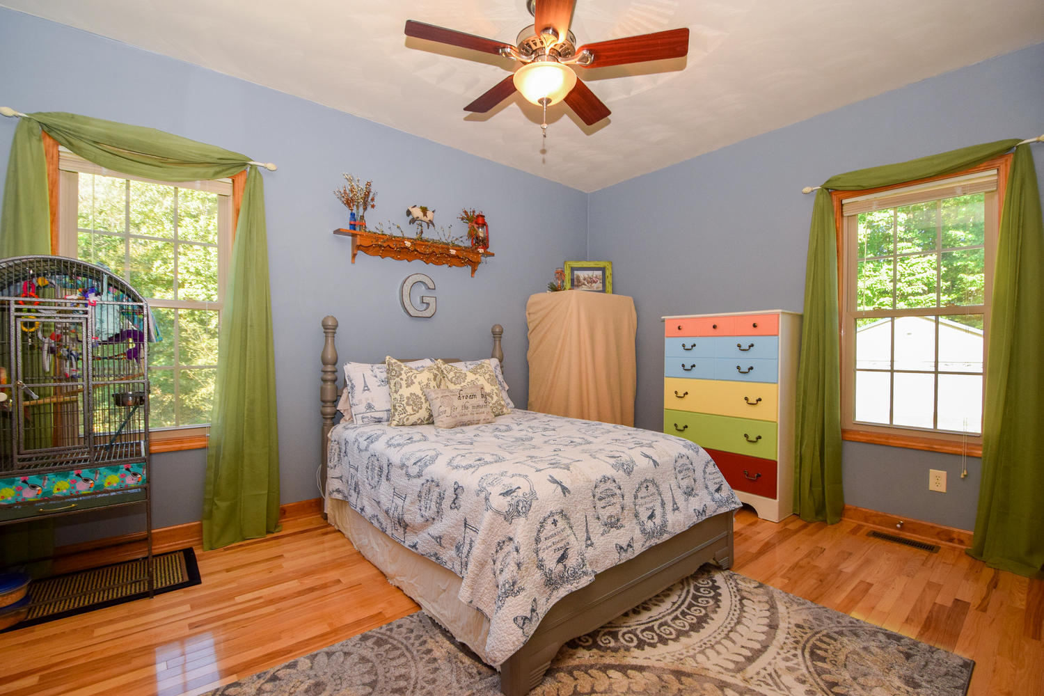 213 W Road Blue Ridge, VA 24064 - Photo 19 of 51 a bedroom with a bed and wooden floor