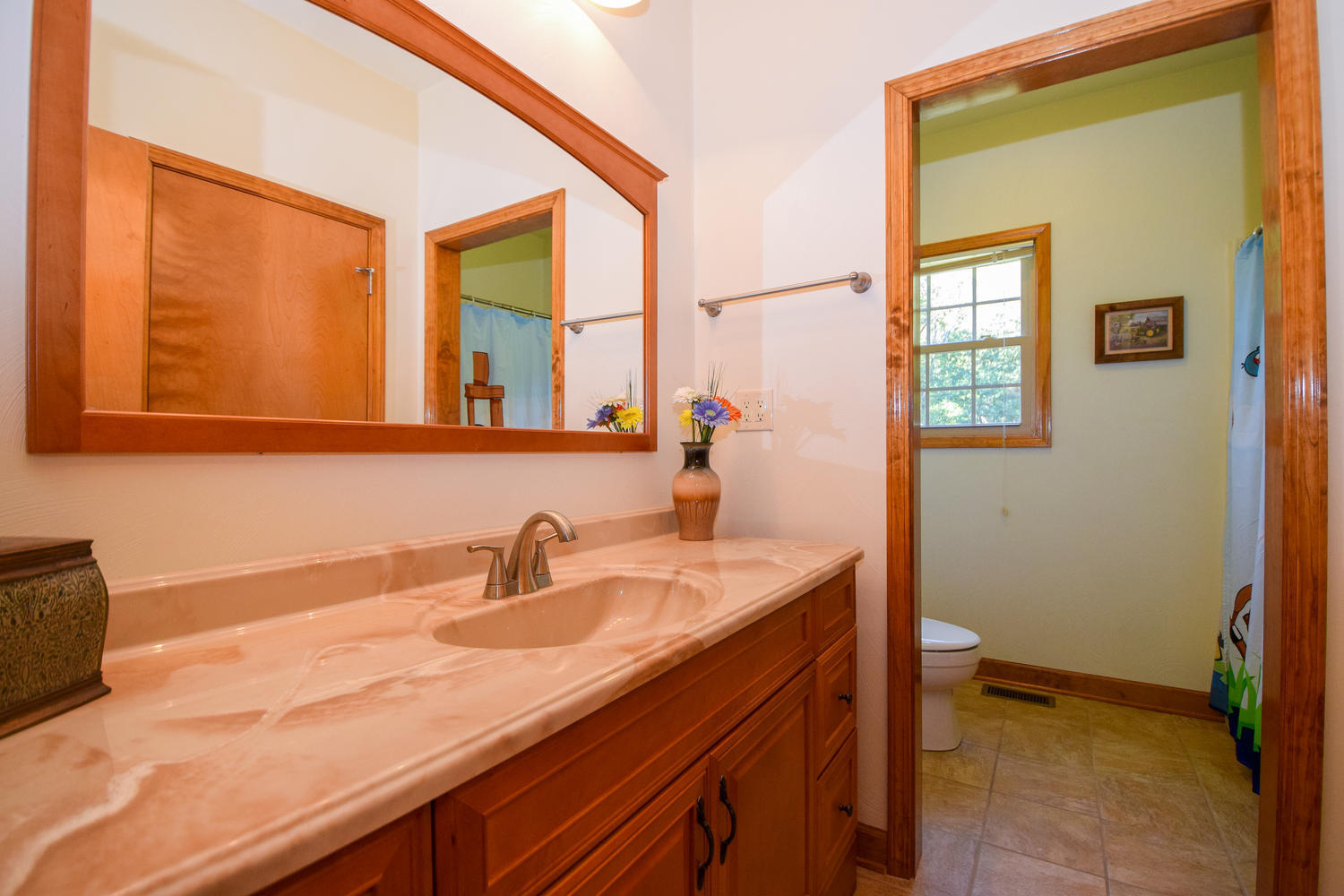 213 W Road Blue Ridge, VA 24064 - Photo 21 of 51 a bathroom with a sink and a mirror