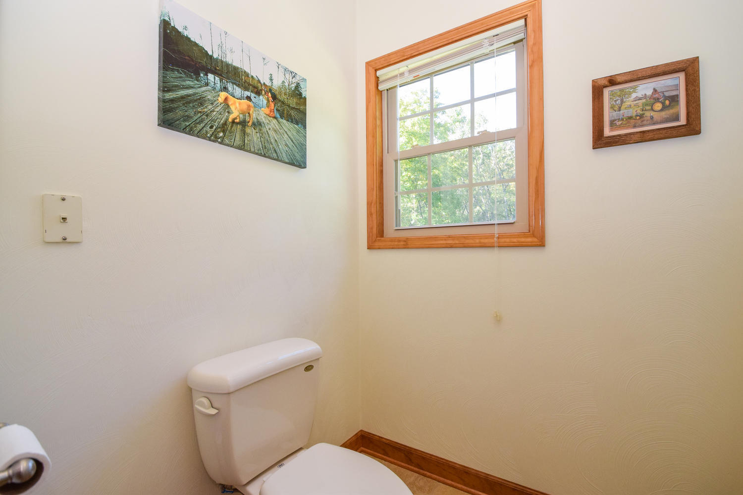 213 W Road Blue Ridge, VA 24064 - Photo 22 of 51 a white toilet sitting next to a window