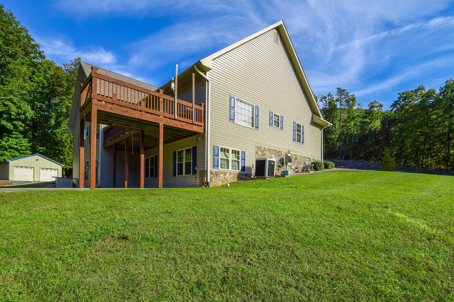 213 W Road Blue Ridge, VA 24064 - Photo 30 of 51 a view of a house with backyard and garden