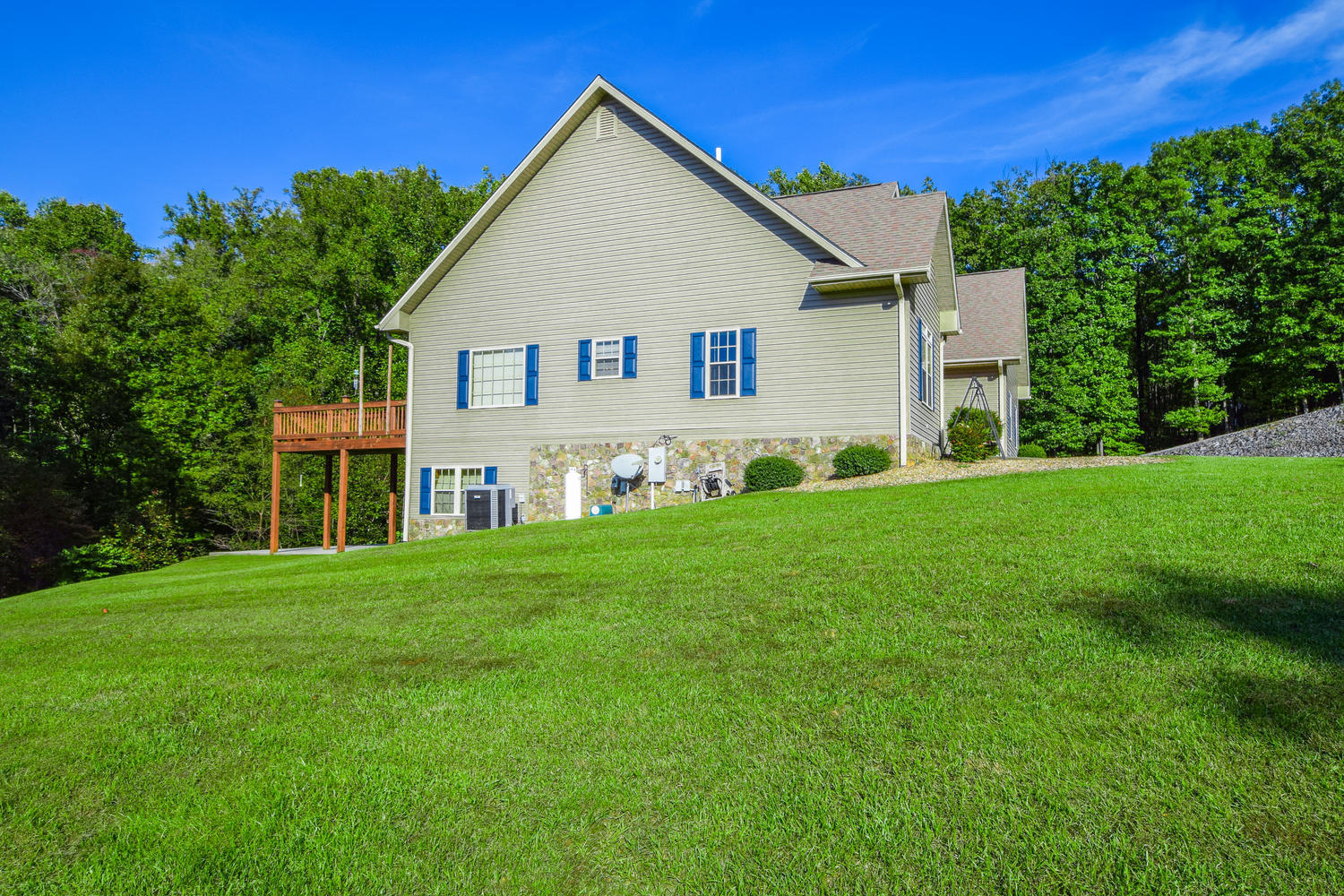213 W Road Blue Ridge, VA 24064 - Photo 31 of 51 a front view of a house with a yard and trees