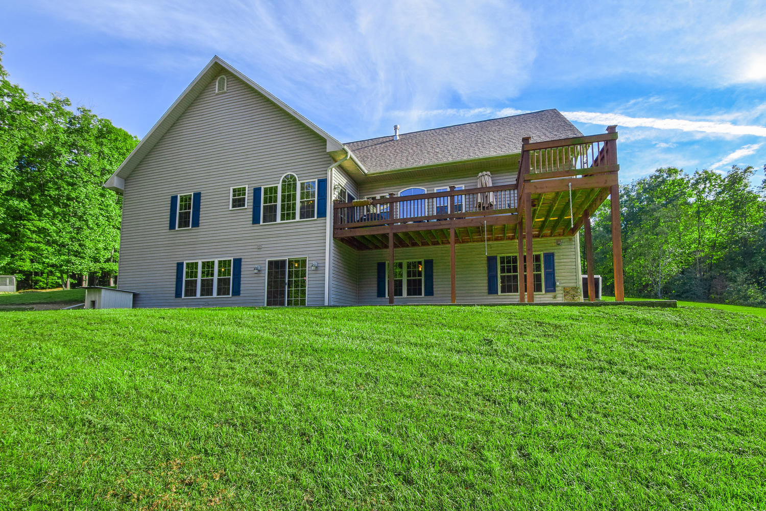213 W Road Blue Ridge, VA 24064 - Photo 32 of 51 a view of a big house with a big yard and large trees