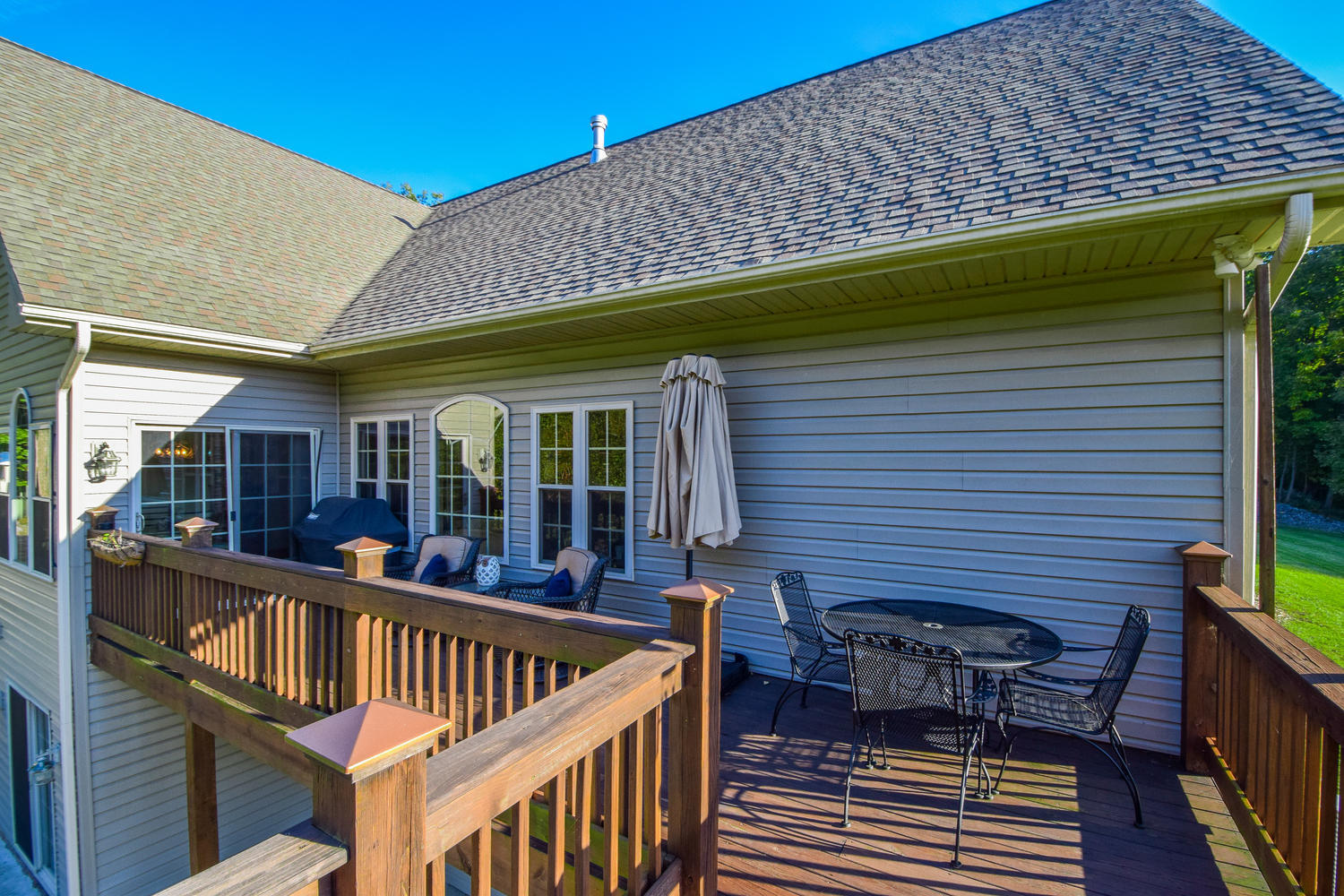213 W Road Blue Ridge, VA 24064 - Photo 33 of 51 a front view of a house with barbeque wooden floor and furniture