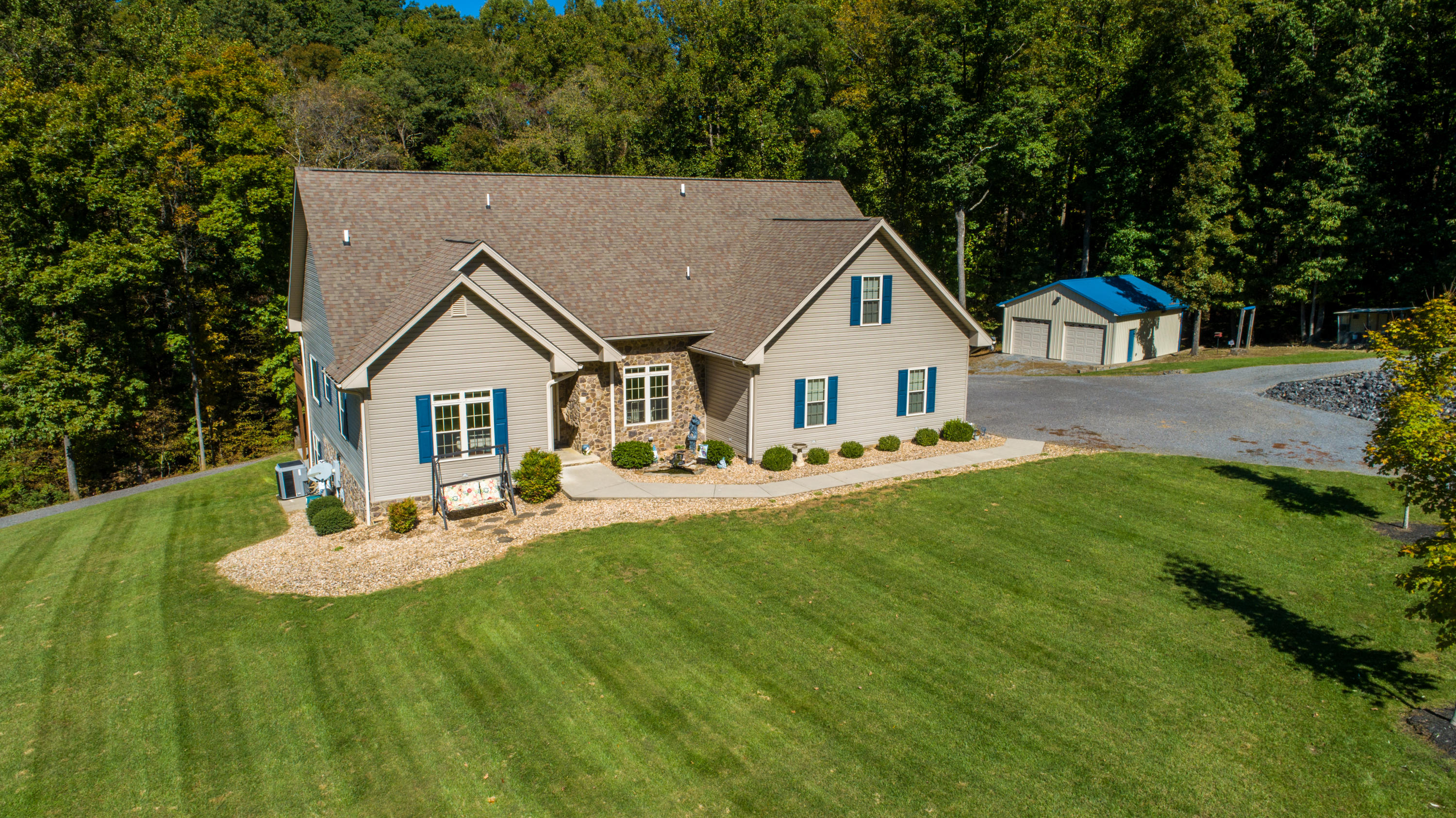 213 W Road Blue Ridge, VA 24064 - Photo 49 of 51 a aerial view of a house with swimming pool and a yard