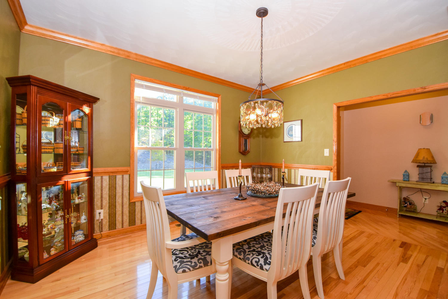 213 W Road Blue Ridge, VA 24064 - Photo 8 of 51 a view of a dining room with furniture window and wooden floor