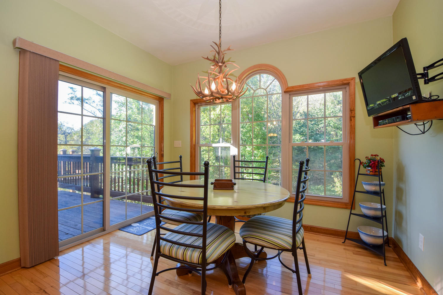 213 W Road Blue Ridge, VA 24064 - Photo 9 of 51 a view of a dining room with furniture window and wooden floor