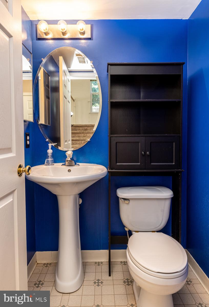 2 Kimberly Drive Middletown, DE 19709 - Photo 14 of 32 a bathroom with a toilet sink and mirror