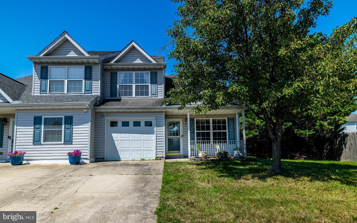 2 Kimberly Drive Middletown, DE 19709 - Photo 2 of 32 a front view of a house with a yard and garage
