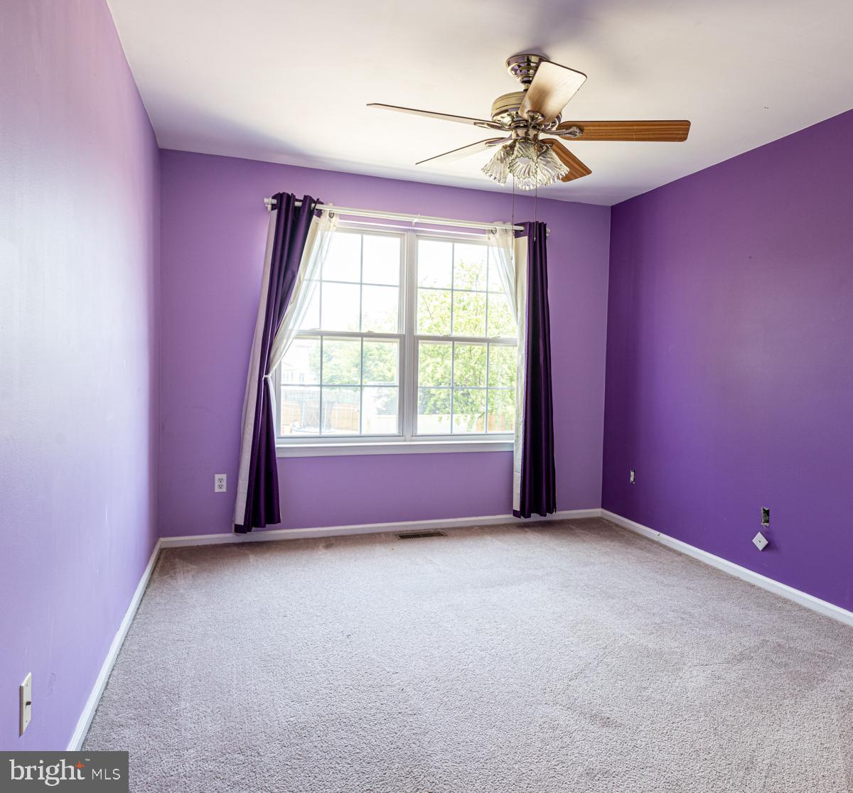 2 Kimberly Drive Middletown, DE 19709 - Photo 23 of 32 an empty room with windows and chandelier fan