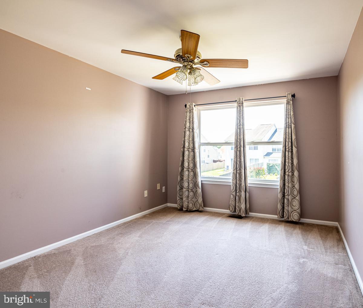 2 Kimberly Drive Middletown, DE 19709 - Photo 25 of 32 an empty room with windows and fan
