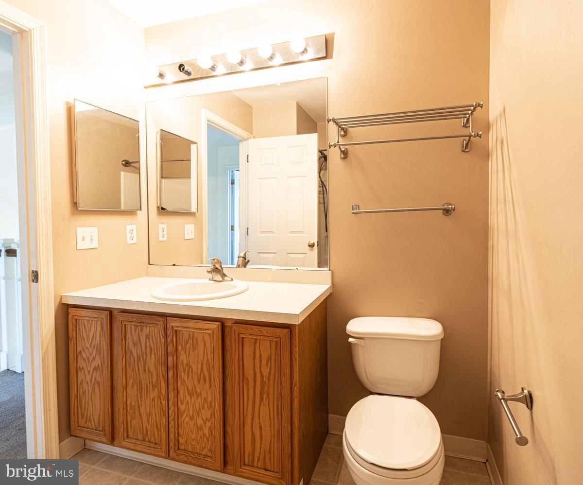 2 Kimberly Drive Middletown, DE 19709 - Photo 27 of 32 a bathroom with a granite countertop sink toilet and shower
