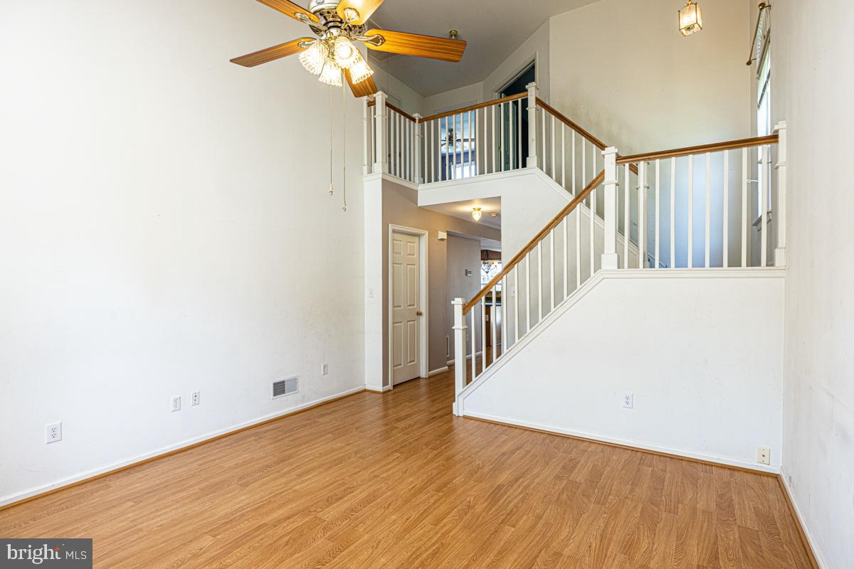 2 Kimberly Drive Middletown, DE 19709 - Photo 7 of 32 a view of entryway and hall with wooden floor