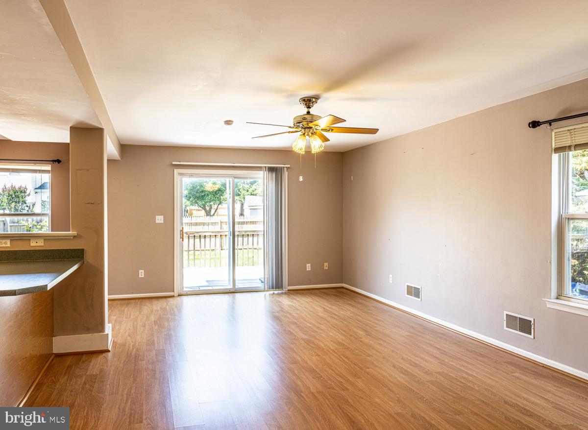 2 Kimberly Drive Middletown, DE 19709 - Photo 9 of 32 a view of an empty room with window and wooden floor