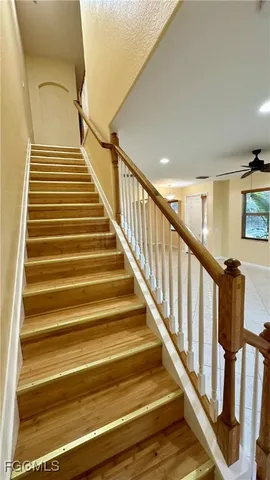 a view of gallery with wooden floor