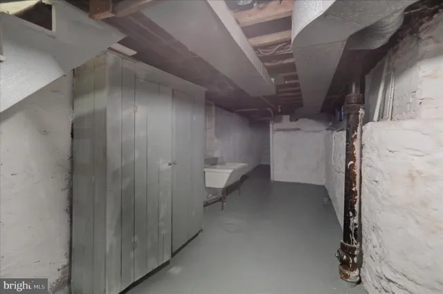 a view of a room with wooden walls