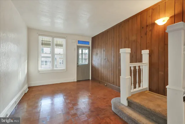 a view of livingroom with furniture and windows