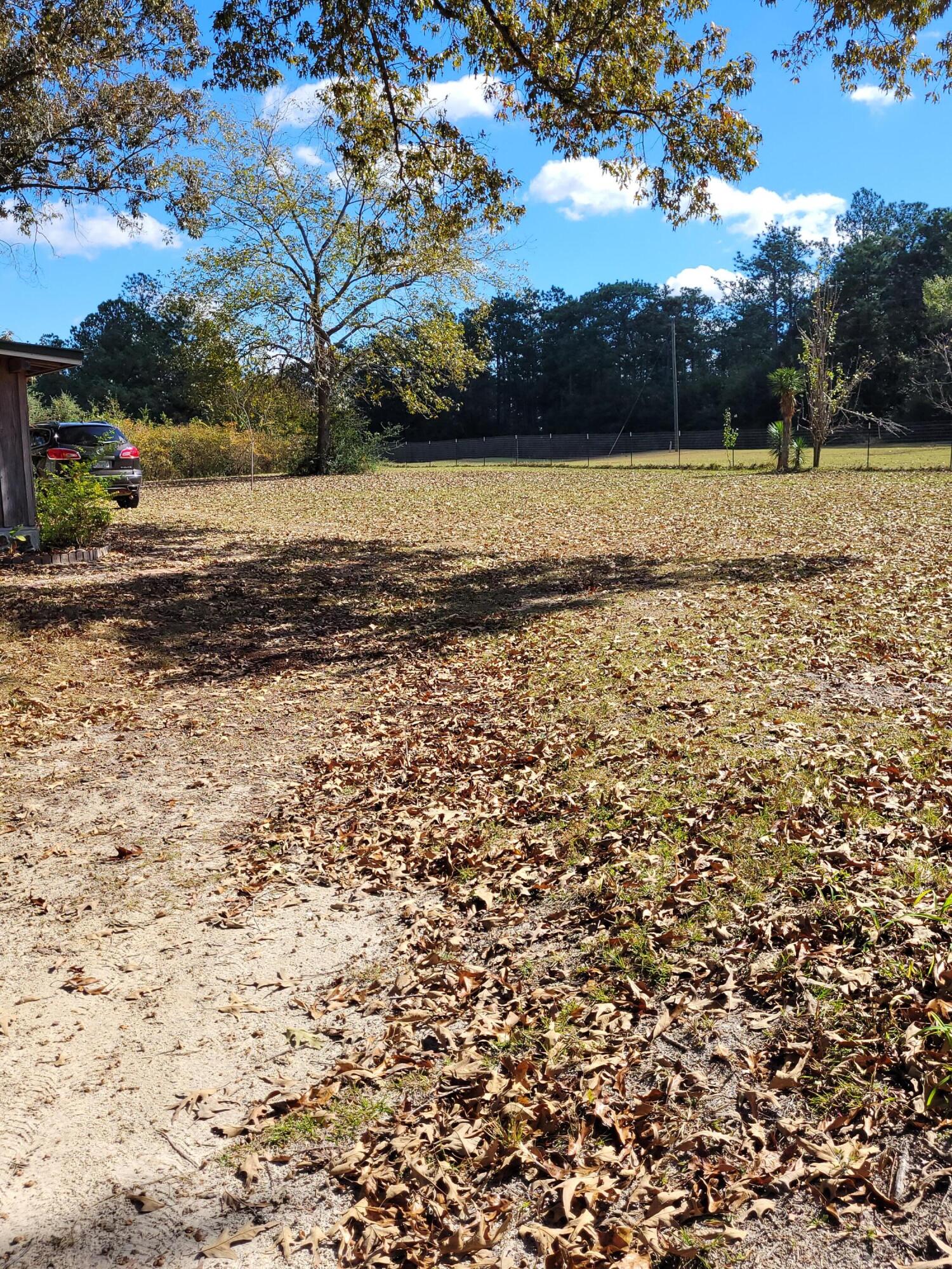 7363 Beaver Creek Road Baker, FL 32531 - Photo 15 of 29 a view of an ocean beach